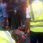 Hawker Falls Off A Bridge In Lagos After Being Hit By A Danfo Bus. Photos